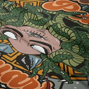 Close-up of bohemian Medusa tapestry with snake hair and Greek key motifs