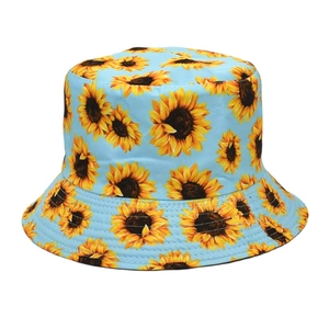 Detailed view of light blue sunflower pattern on a sun protection bucket hat fabric