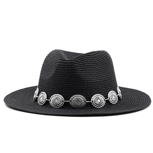 Detail of black straw fedora hat featuring a silver sunflower metal chain decoration