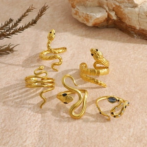 French style 18K gold snake rings set with blue zircon and black enamel details