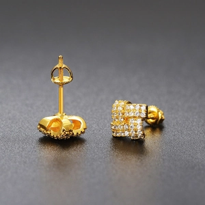 Detailed view of gold plated screw-back stud earrings with square zircon pavé setting