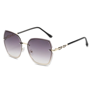 Frameless butterfly metal sunglasses with gradient purple lenses and chain-style gold arms