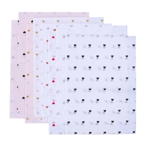 Delicate heart-patterned tissue paper in pink and white for floral and gift wrapping