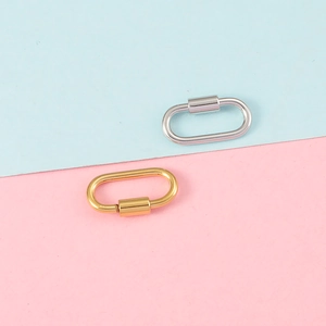 Detailed view of oval gold and silver stainless steel screw clasps for DIY jewelry making