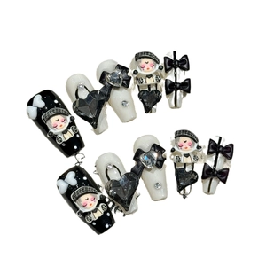 Dark punk 3D press-on nails set with black bows, heart rhinestones, and anime girl artwork