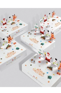 Detail view of foldable Christmas gift boxes featuring cartoon Santa and reindeer illustrations