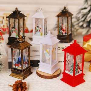 Vintage style Christmas lanterns with Santa and Snowman patterns on wooden table