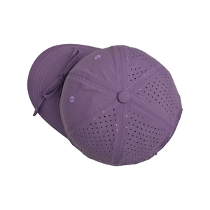 Detail view of purple quick-dry baseball cap with bow knot and breathable perforations