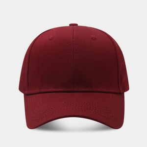 Close-up of wine red baseball cap showing premium twill cotton fabric and stitching details