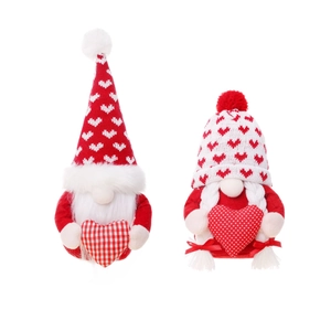 Christmas gnome plush set with knitted heart hats and long white beards on white background