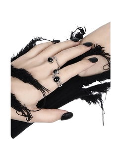 Detail of irregular S925 silver rings featuring inlaid black agate stones on hand