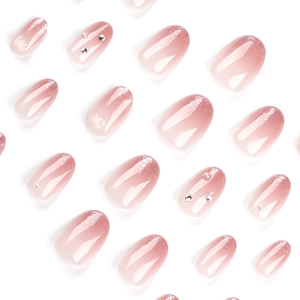 Pink ombré press-on nails with silver glitter, white pearls and sparkling rhinestones