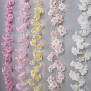 Artificial cherry blossom vines in five colors for wall decoration and pipe coverage