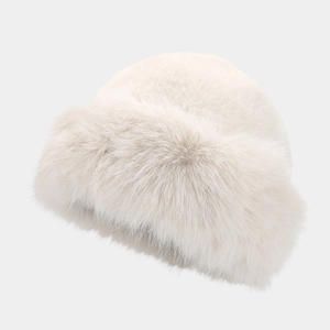Close-up of the plush texture on this cream faux fur Russian style winter bucket hat