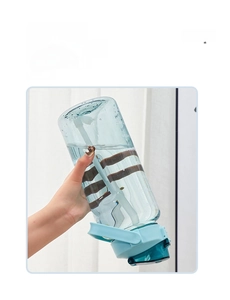 Close-up of leakproof 2L sport water bottle with straw and ergonomic grip handle