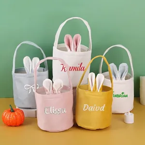 Customized Easter bunny ear baskets in colorful velvet fabric with embroidered names