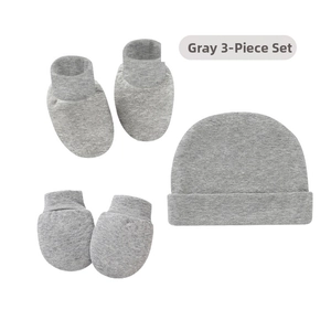 Detail of 3-piece newborn set including heather gray knitted hat, mittens, and socks