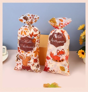 Detail of Thanksgiving OPP gift bags with maple leaf and squirrel prints for autumn candy