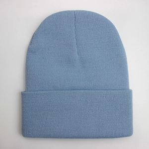 Classic light blue knit beanie hat with soft texture for winter warmth, top view
