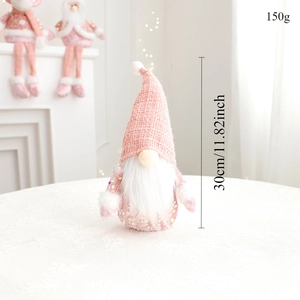 Detail of pink Christmas gnome plush showing 30cm height and 150g weight specifications