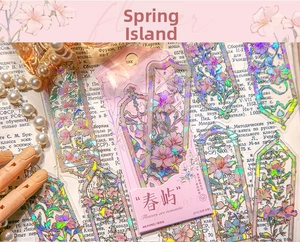 Macro view of holographic PVC floral bookmarks with laser cutouts and iridescent finish