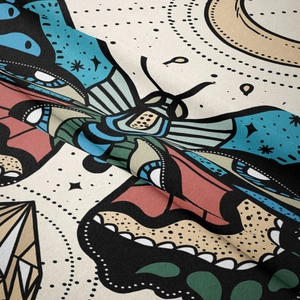 Close-up of bohemian butterfly tapestry fabric showing intricate wing patterns and textures