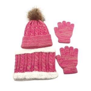 Detailed knit pattern of rose pink winter hat, scarf and gloves set with faux fur lining