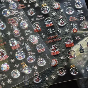 Macro view showing 3D embossed Christmas nail stickers with Santa and snowflake patterns