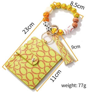 Detailed view of neon baseball pattern card holder with beaded sports charm keychain