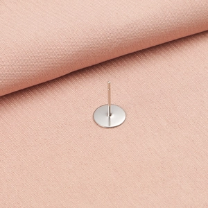 Close-up of a silver stainless steel flat head earring post for DIY jewelry making