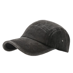 Vintage washed 5-panel baseball cap in distressed black with metal eyelets and adjustable strap