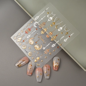 5D embossed nail art stickers with gold Ramadan lanterns, crescent moon and star patterns