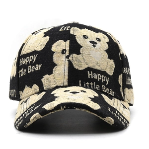 Close-up of bear embroidery and Happy Little Bear text on black woven baseball cap