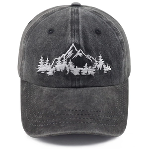 Vintage washed dark grey baseball cap featuring detailed mountain forest embroidery
