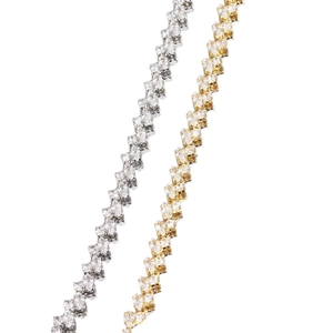 Minimalist lightning-shaped tennis bracelets in gold and silver with white cubic zirconia