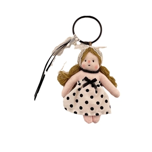 Handmade plush doll keychain with floral dress, lace headscarf and golden hair detail