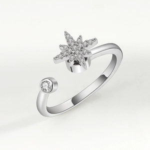 Rotating snowflake open ring with sparkling zircon star and round diamond accents