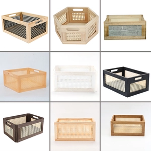 Detailed macro view showing multiple colors and textures of woven wooden storage baskets