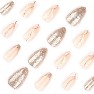 Sparkling gold glitter press-on nails with almond shape and elegant wavy line patterns