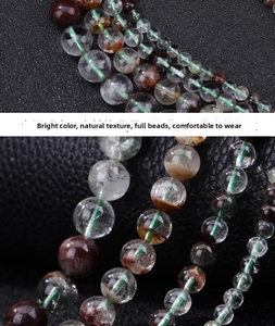 Macro detail of natural green phantom quartz beads showing unique mineral inclusions