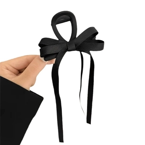 Matte black bow hair claw clip with long elegant ribbons for women hair styling