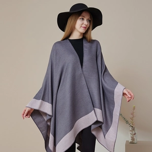 Elegant grey striped poncho cape for women with contrasting borders and soft knit texture