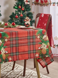 Detailed Christmas red plaid tablecloth featuring festive gingerbread house and wreath prints