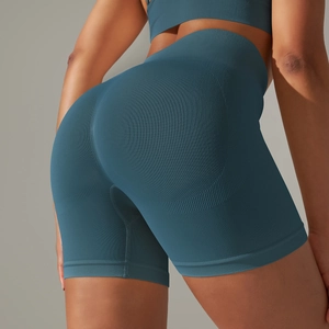 Detail view of seamless high-waist yoga shorts with scrunch butt lifting texture