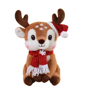 Plush Christmas reindeer doll with red sequin hat and scarf on white background