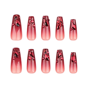 Square gradient red press-on nails with glitter finish and 3D rhinestones on white background