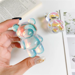 Close-up of laser aurora bear phone socket with vibrant iridescent holographic finish