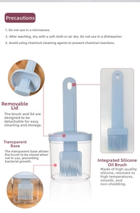 Detail of light blue heat-resistant silicone oil brush with a clear storage base stand