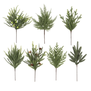 Artificial Christmas pine branches with green berries and small cones for festive decor