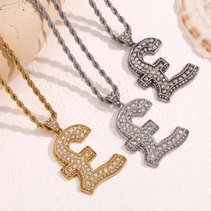 Detailed view of rhinestone-encrusted pound symbol pendants in gold, silver, and grey finish
